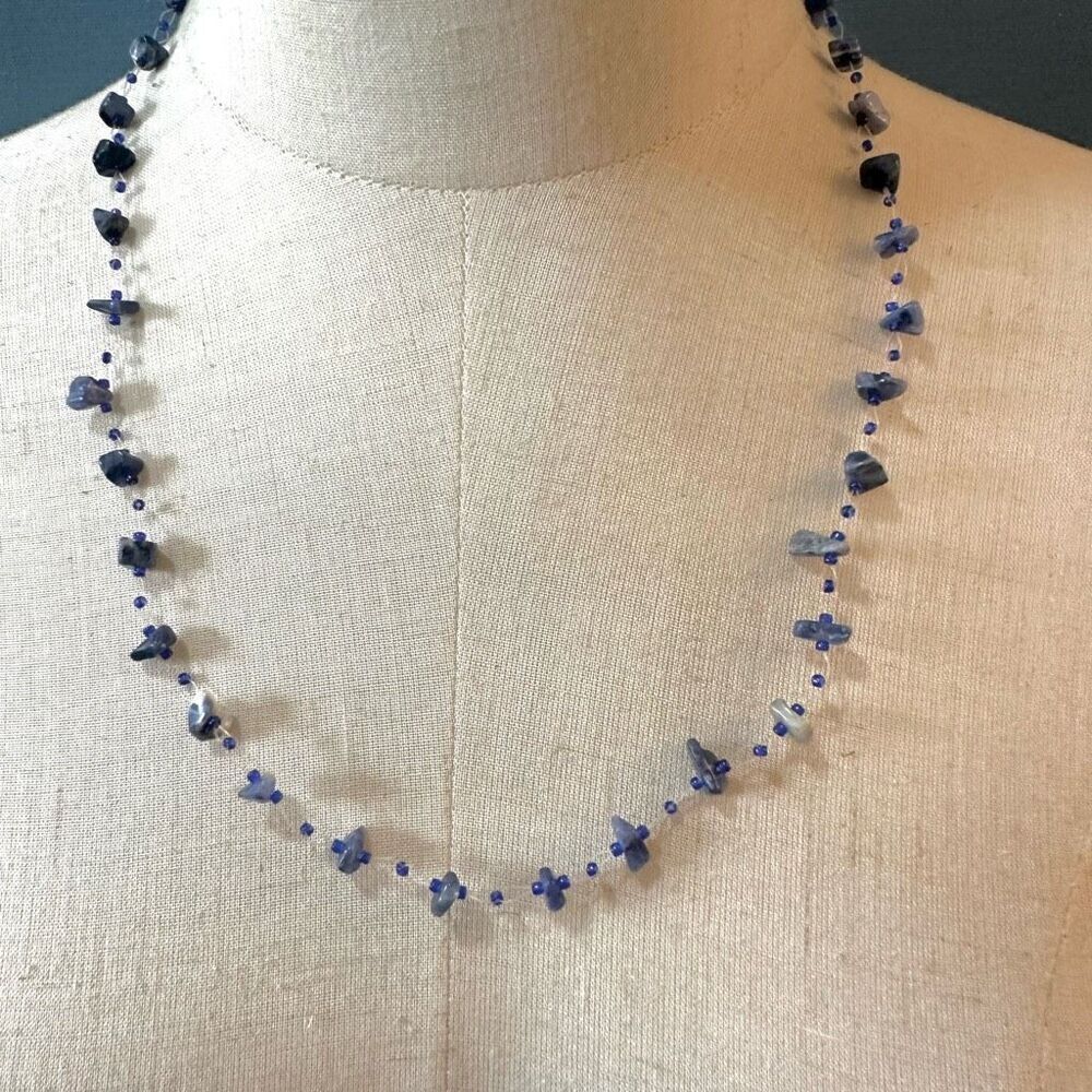 lapis  lazuli chip beaded necklace on clear cord